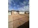 Picture of a single story house and desert landscaping under a cloudy blue sky at 2820 Fort Sumter Dr, North Las Vegas, NV 89030
