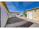 Backyard featuring walkway between two outbuildings at 2832 Geist Cir, Las Vegas, NV 89115