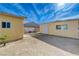 Backyard featuring two outbuildings with perimeter block wall at 2832 Geist Cir, Las Vegas, NV 89115
