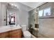 Bright bathroom with tiled shower, toilet, and vanity, perfect for refreshing and modern living at 2832 Geist Cir, Las Vegas, NV 89115