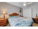 Comfortable bedroom with tiled floors, decorated with a guitar at 2832 Geist Cir, Las Vegas, NV 89115