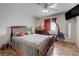 Bedroom featuring a bed and window with natural light at 2832 Geist Cir, Las Vegas, NV 89115
