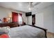 Comfortable bedroom featuring tiled floors and natural light at 2832 Geist Cir, Las Vegas, NV 89115