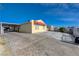 Cozy home featuring a carport, stamped concrete driveway, and a red tile roof accent at 2832 Geist Cir, Las Vegas, NV 89115