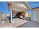 Detached garage with side door, ample storage space and access to the backyard at 2832 Geist Cir, Las Vegas, NV 89115