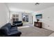 Bright living room with sliding glass doors to the back yard at 2877 Sweeping Palm Rd, North Las Vegas, NV 89086