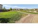 A walking path meanders through a neighborhood park with mountain views at 2877 Sweeping Palm Rd, North Las Vegas, NV 89086