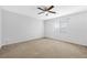 A spacious bedroom with carpet and a window at 3314 Villa Fiori Ave, Las Vegas, NV 89141
