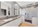 Modern bathroom features a double sink vanity, sleek fixtures, and a glass enclosed shower at 3495 Luca Point Ave, Henderson, NV 89044
