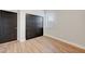 Clean bedroom with natural light and expansive closet with sleek, modern doors at 3495 Luca Point Ave, Henderson, NV 89044