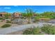 Beautiful community park with walking path, benches and lush greenery, perfect for enjoying the outdoors at 3495 Luca Point Ave, Henderson, NV 89044