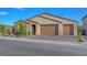 Lovely one-story home featuring a three-car garage and inviting curb appeal at 3495 Luca Point Ave, Henderson, NV 89044