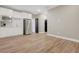 The kitchen has an open floor plan, modern flooring, and stainless-steel appliances at 3495 Luca Point Ave, Henderson, NV 89044