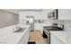 Well-equipped kitchen featuring stainless steel appliances, a gas range, and an island with a sink at 3495 Luca Point Ave, Henderson, NV 89044