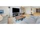 Comfortable living room featuring stylish industrial accents and contemporary furniture at 3495 Luca Point Ave, Henderson, NV 89044