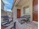 Inviting brick patio featuring comfortable wicker seating, providing a relaxing outdoor space at 3495 Luca Point Ave, Henderson, NV 89044