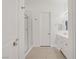 Modern bathroom featuring shower with glass door and large vanity with sink at 390 Inflection St, Henderson, NV 89011