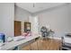Home office features wood floors, a modern desk, and a comfortable office chair at 390 Inflection St, Henderson, NV 89011