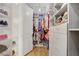 Well-organized walk-in closet featuring custom storage solutions at 390 Inflection St, Henderson, NV 89011