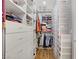 Spacious walk-in closet with custom shelves and drawers at 390 Inflection St, Henderson, NV 89011