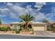 Charming single-story home featuring a desert landscape and a two-car garage at 4134 Riva De Tierra Ln, Las Vegas, NV 89135