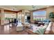 Comfortable living room with wood floors, recessed lighting, and backyard views at 4134 Riva De Tierra Ln, Las Vegas, NV 89135