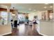 Spacious living area with wood floors, natural light, and open layout at 4134 Riva De Tierra Ln, Las Vegas, NV 89135