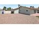 Backyard featuring desert landscaping, showcasing the home's outdoor space at 4573 Plaza De Vista St, Las Vegas, NV 89120