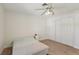 Bedroom featuring a ceiling fan and closet with louvered doors at 4573 Plaza De Vista St, Las Vegas, NV 89120