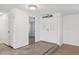 Entryway with white double doors, tiled flooring, and access to the main living areas at 4573 Plaza De Vista St, Las Vegas, NV 89120