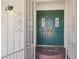 Elegant double front doors with decorative glass panels and brass hardware at 4573 Plaza De Vista St, Las Vegas, NV 89120