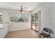 Kitchen with tile floors and breakfast bar offers view of the backyard at 4573 Plaza De Vista St, Las Vegas, NV 89120