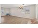 Bright living room features tile floors and abundant natural light at 4573 Plaza De Vista St, Las Vegas, NV 89120
