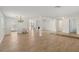 Open-concept living room featuring tiled floors, and ample natural light at 4573 Plaza De Vista St, Las Vegas, NV 89120