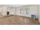 Bright living room with large windows, tiled floors and open floor plan at 4573 Plaza De Vista St, Las Vegas, NV 89120