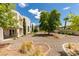 The backyard is ready for entertaining, offering a patio and drought-tolerant landscaping at 4765 N Grand Canyon Dr, Las Vegas, NV 89129