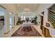 Grand foyer with tiled floors, high ceilings, chandelier lighting, and ample space for entertaining at 4765 N Grand Canyon Dr, Las Vegas, NV 89129