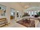 Spacious foyer with tiled floors, high ceilings, chandelier lighting, and open access to the living areas at 4765 N Grand Canyon Dr, Las Vegas, NV 89129