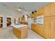 Kitchen boasting sleek countertops, tiled flooring and modern appliances at 4765 N Grand Canyon Dr, Las Vegas, NV 89129