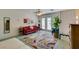 Bright living area with an open layout, colorful rug, and access to the outdoor patio at 4765 N Grand Canyon Dr, Las Vegas, NV 89129
