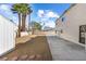 Backyard featuring desert landscaping, a shed, and a view of the back of the house at 5035 Meadow Grove Ct, Las Vegas, NV 89120
