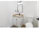 Bathroom featuring modern fixtures, granite countertops, and updated lighting at 5035 Meadow Grove Ct, Las Vegas, NV 89120