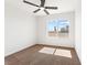 Bright bedroom with ceiling fan and large window offering lots of natural light at 5035 Meadow Grove Ct, Las Vegas, NV 89120