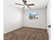 Bright bedroom with a ceiling fan and large windows providing ample natural light at 5035 Meadow Grove Ct, Las Vegas, NV 89120