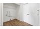 Bright laundry area with shelving, hookups, and closet with double doors at 5035 Meadow Grove Ct, Las Vegas, NV 89120
