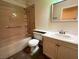 Neutral toned bathroom featuring a bathtub, toilet and vanity sink at 5512 Oakwood Ridge St, Las Vegas, NV 89130