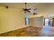 Large living room featuring decorative lighting and seamless access to the backyard at 5512 Oakwood Ridge St, Las Vegas, NV 89130
