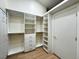 Large custom walk-in closet with open shelving and ample storage at 5512 Oakwood Ridge St, Las Vegas, NV 89130