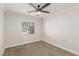 Bedroom featuring a ceiling fan and a bright window at 5588 La Sendas Ct, Las Vegas, NV 89122