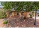 Charming single-story home featuring a well-maintained yard, mature tree, and a two-car garage at 5588 La Sendas Ct, Las Vegas, NV 89122